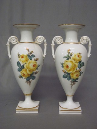 A pair of "Dresden" twin handled porcelain urns, the base with crossed sword mark and impressed P62 (1 f and r) 13"