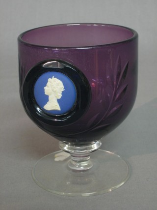 A Wedgwood purple coloured glass goblet to commemorate the Queens Silver Jubilee