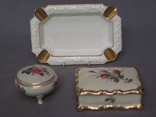 A rectangular Rosenthal porcelain jar and cover decorated roses 5", do. ashtray 8" and a West German porcelain jar and cover 3"
