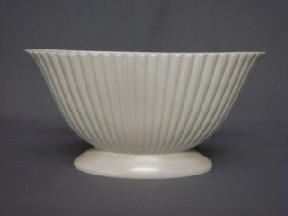 A white glazed Dartmouth pottery boat shaped vase 14"