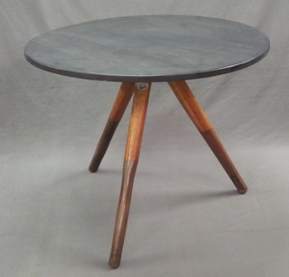 A circular "cricket" table, the legs formed from Norris & Sons oars 35"
