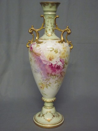 A large and impressive German Pottery twin handled vase with floral decoration 20"