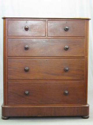 A Victorian mahogany D shaped chest of 2 short and 3 long drawers with tore handles, raised on a platform base 43"