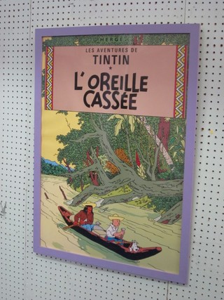 A coloured Tin Tin poster - "Tin Tin L'Oreille Casse" 26" x 19"