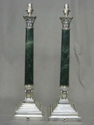 A pair of silver plated table lamps with Corinthian capitals and marble columns 24"