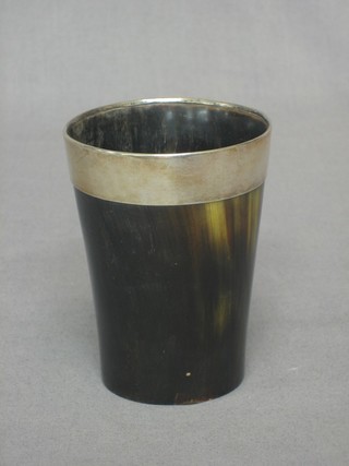 A 19th Century horn beaker with silver plated mount