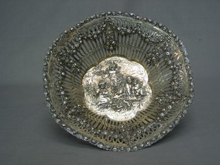 A handsome Continental pierced and embossed white metal bowl decorated cherubs 10"