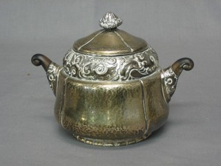 A circular Continental planished silver twin handled sucrier, base marked 800