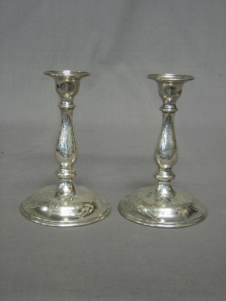 A pair of Continental engraved silver candlesticks 6 1/2"