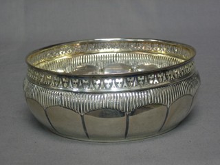 A circular pierced Continental silver bowl with demi reeded decoration 8 ozs