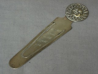 A silver book mark in the form of the Sun marked Always Look on the Bright Side, London 1918