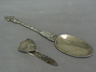 A Continental silver spoon decorated an apostle 1 ozs together with a silver book mark?