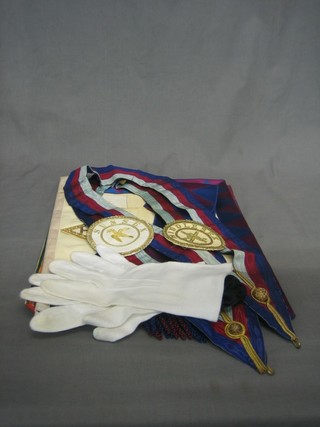 A quantity of Masonic regalia comprising a Royal Ark Mariner's Past Commanders apron, a Royal Arch companions apron (f), do. sash, 2 Royal Arch Provincial Officer's collars, 2 apron badges, a mourning rosette and pair of gloves