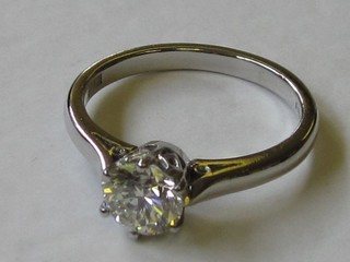 A platinum engagement/dress ring set a diamond, approx 0.77ct