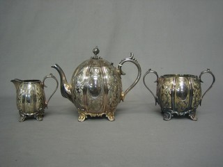 A Victorian oval 3 piece silver plated tea service comprising tea pot, cream jug and sugar bowl