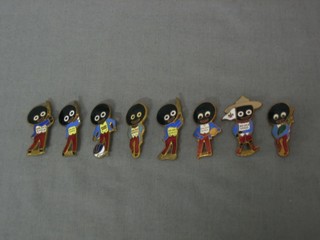 8 various enamelled Gollywog badges