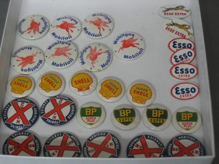 7 Redex badges, 4 BP badges, 5 Shell badges, 7 Mobil badges and 6 Esso Extra badges