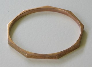 A 9ct gold bangle