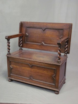 An oak monks bench with hinged lid 33"