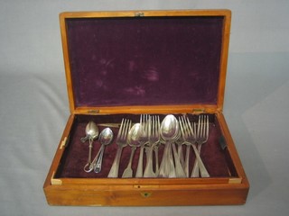 A walnut canteen box and a collection of silver plated flatware