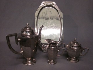 An Art Deco 4 piece silver plated coffee service comprising octagonal coffee pot, cream jug, sugar bowl and tray