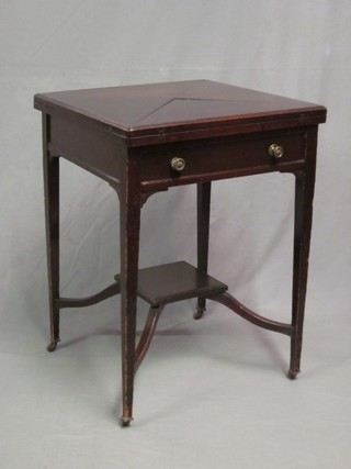 An Edwardian mahogany envelope card table, the base fitted a drawer and raised on square tapering supports with undertier 22"