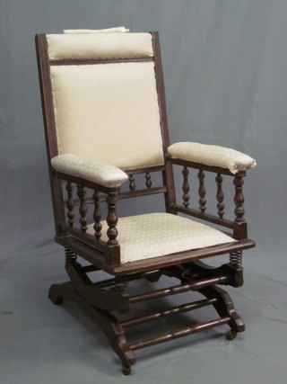 An American beech rocking chair with bobbin turned decoration