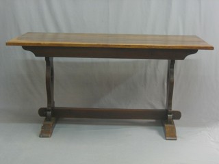 An elm refectory style dining table with standard end supports 60"