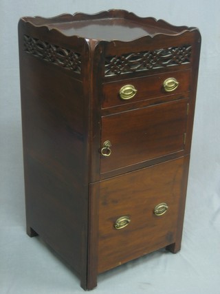 A 19th Century mahogany tray top commode fitted a drawer above a cupboard 17"