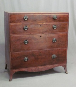 A Georgian mahogany chest with satinwood stringing, fitted 4 long graduated drawers with oval brass plate drop handles, raised on splayed bracket feet 40"