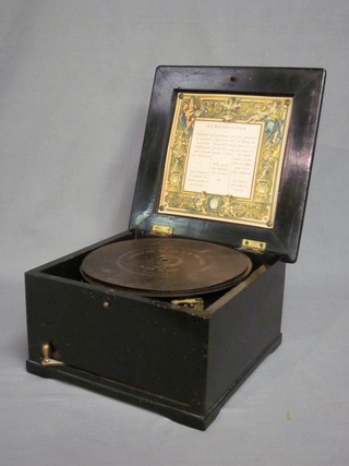 A Symphonium Brevet Patent  9 1/2" Polyphon with 4 discs, contained in an ebonised case