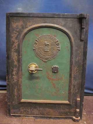 A metal safe by S Withers & Co 20" x 22" x 30", complete with key