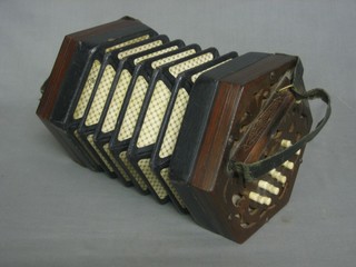A 19th Century 6 sided rosewood concertina with 31 ivory buttons by C Jones, some damage to fret work