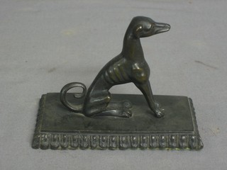 A 19th Century bronze paperweight in the form of a standing grey hound 4"