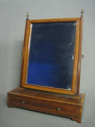 A 19th Century rectangular mahogany plate mirror contained in a mahogany swing frame, the base fitted a drawer and raised on bracket feet 17"