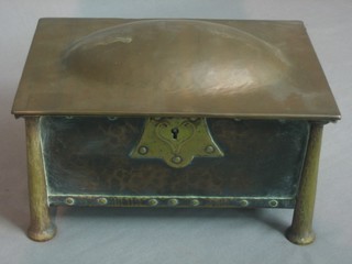 An Art Nouveau rectangular copper and brass trinket box with domed hinged lid 9"