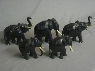 5 ebony and ivory figures of walking elephants
