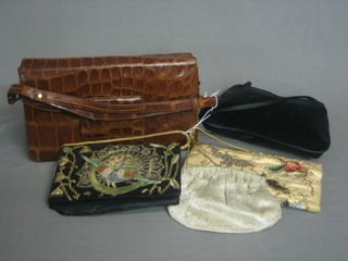 A lady's crocodile handbag and 4 evening bags