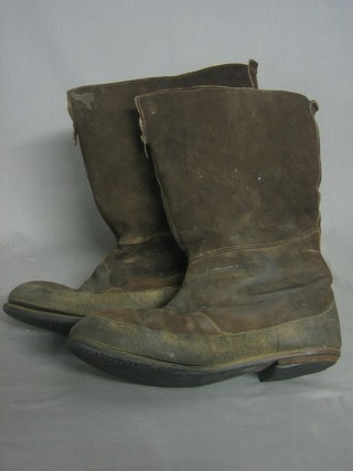A pair of suede flying boots