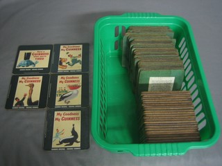 57 various 1994 Guiness coasters