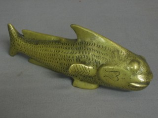 An Eastern bronze figure in the form of a fish 6 1/2"
