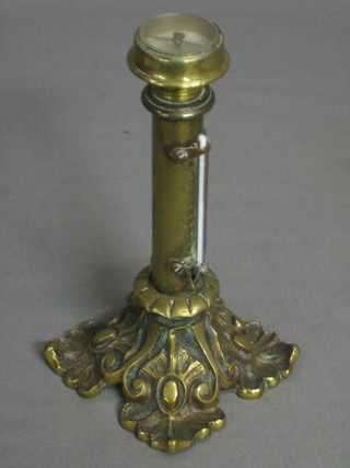A 19th Century brass cased thermometer (f) the top set a compass