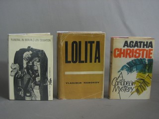 1 vol. Agatha Christie "A Caribbean Mystery" published by the Crime Club 1964, complete with dust wrapper together with Len Deighton "Funeral in Berlin" published by Jonathan Cape 1964 complete with dust wrapper and Vladimir Nabokov 1 vol. "Lolita" by Windfield & Nicholson 1955