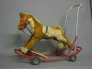 A childs Push-a-long model horse