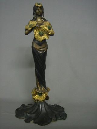 An Art Nouveau style bronze figure of a standing lady 22"