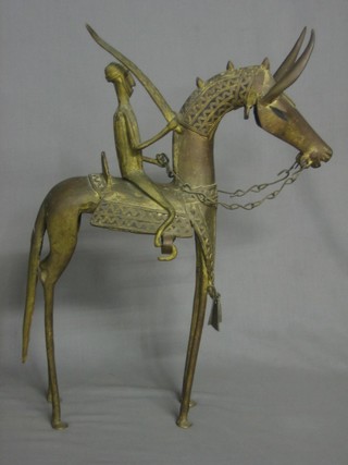 An Eastern gilt bronze figure of a mounted warrior 20"