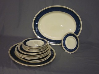 An 18 piece Adderley ware blue patterned dinner service comprising 4 graduated oval meat plates, 4 10" dinner plates, 2 9" side plates (1 cracked) 7 7 1/2" side plates, 6 1/2" saucer