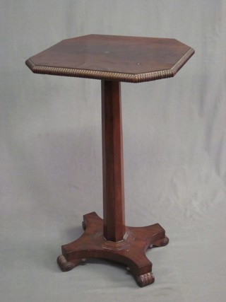A William IV mahogany lozenge shaped occasional table raised on a chamfered column with triform base 18"