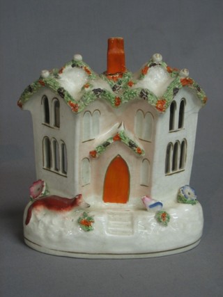 A 19th Century Staffordshire pottery pastel burner in the form of a cottage 6" (f and r)