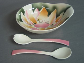 A Clarice Cliff Royal Staffordshire Ceramics shaped salad bowl together with 2 salad servers